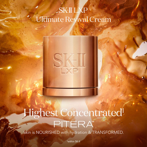 SK-II LXP Ultimate Revival Cream jar in metallic gold placed against golden liquid texture background