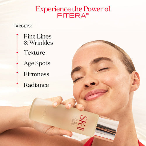 Close-up of an woman holding a skincare bottle to face with product benefits for skin texture and appearance listed beside