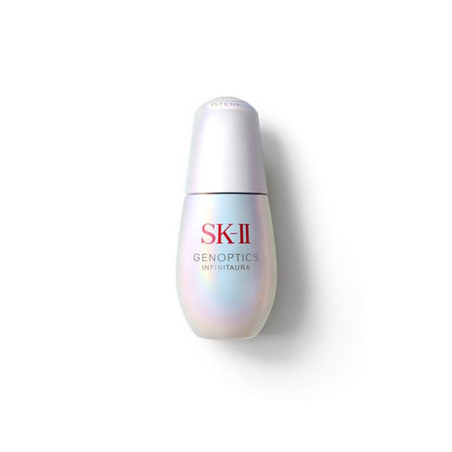 SK-II GenOptics InfinitAura Serum bottle placed on a plain light background with soft shadow