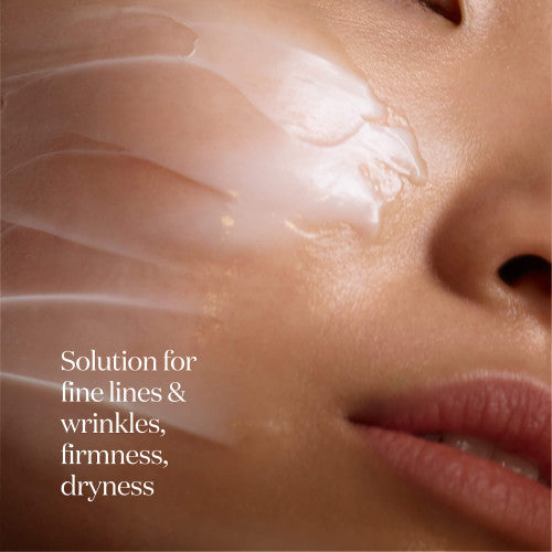 Close-up of SK-II LXP Ultimate Revival Cream applied on cheek and jaw, showing smooth cream texture on skin