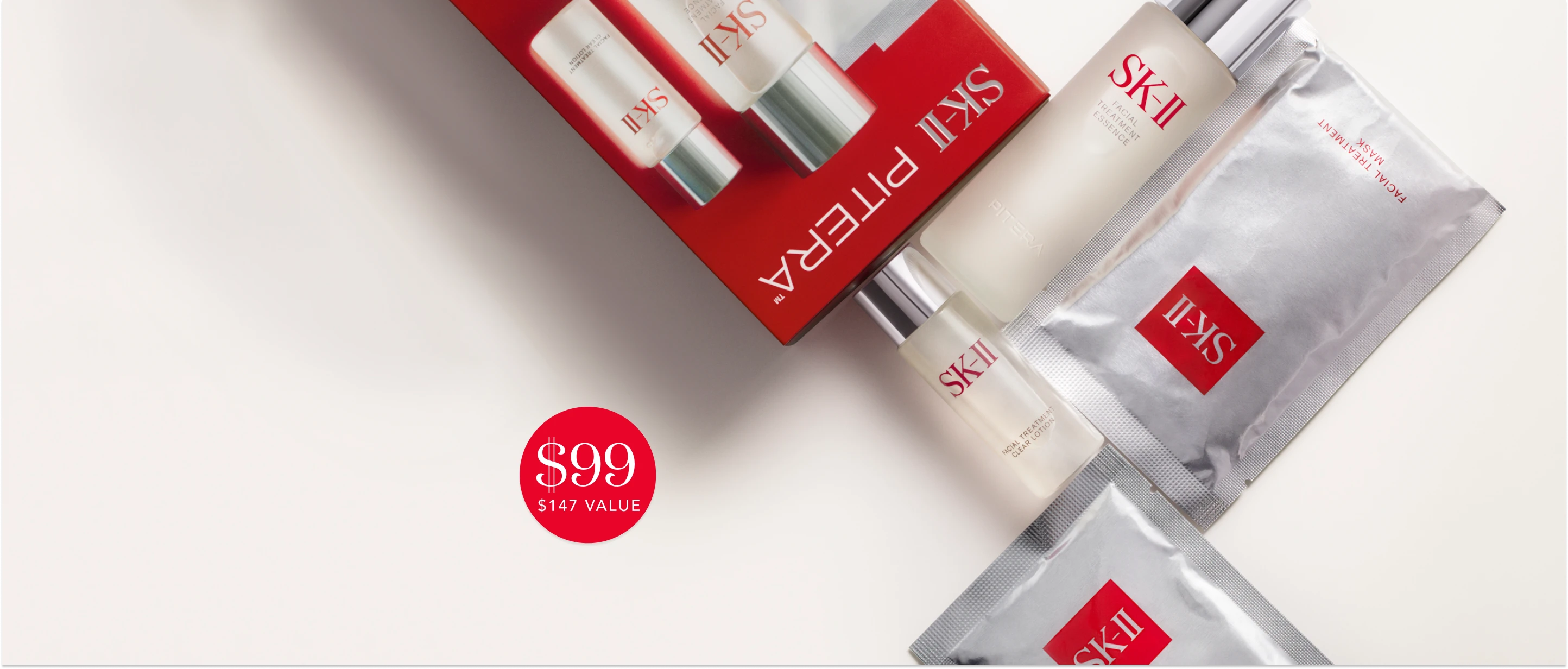 SK‑II First Experience Kit promotional banner showing Facial Treatment Essence and sample products.