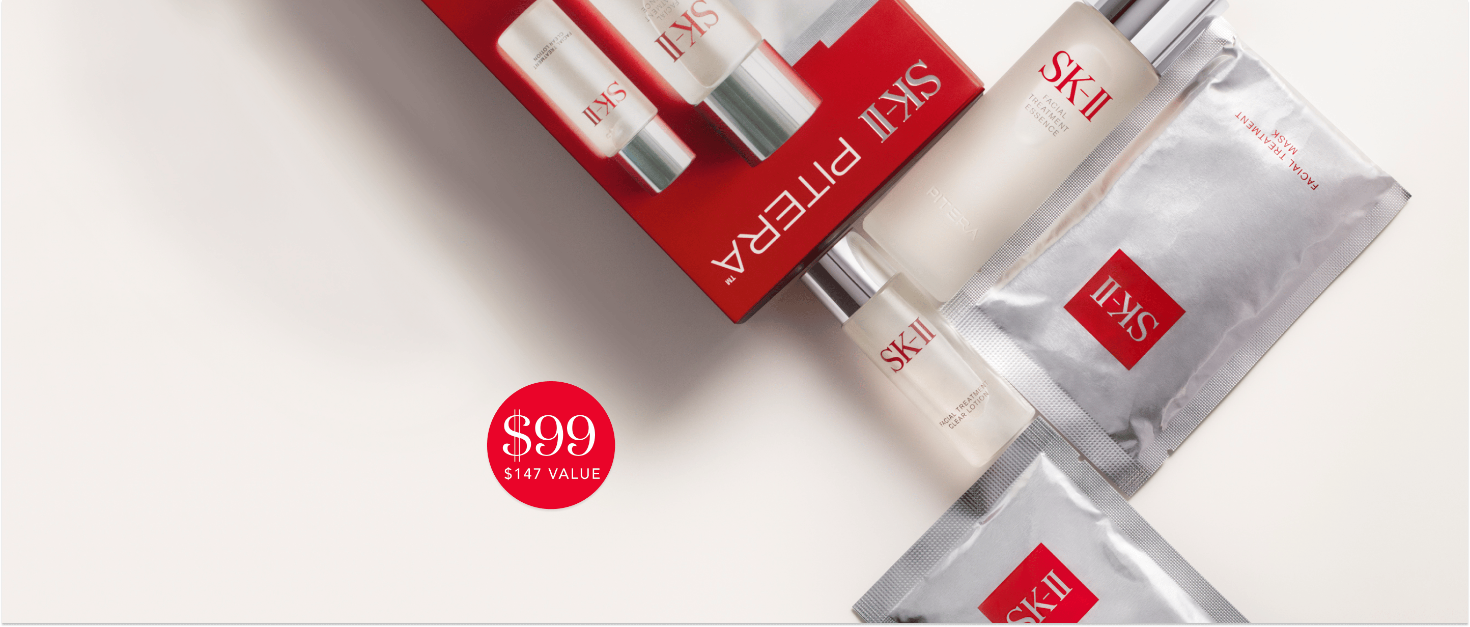 SK-II skincare set with essence, cleanser, mask, and price offer on neutral background