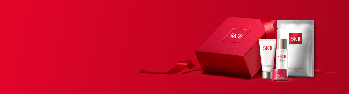 SK‑II Limited Time Gift set with red box and skincare products on red background
 