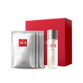 SK-II Glow Up Duo set with Facial Treatment Essence bottle and sheet mask packs placed beside a red box on a transparent background