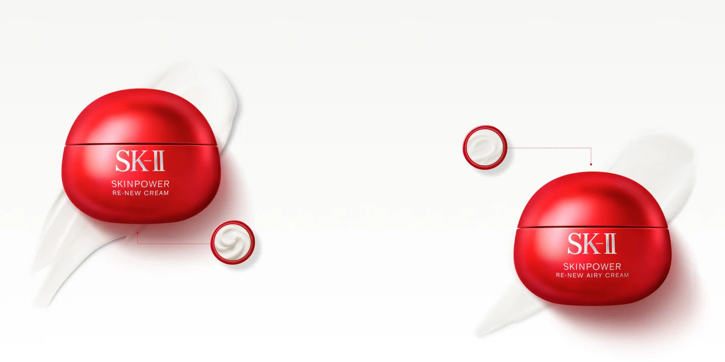Two SK-II Skinpower Re-new Cream containers in signature red packaging, elegantly placed on a clean white background.